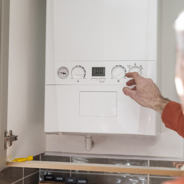 Adjusting a boiler in a home property